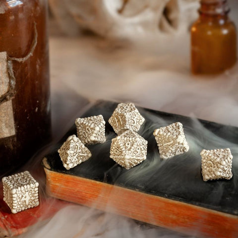 DICE MACABRE SET BEIGE AND BROWN SKULLS 7 DICE RPG PLAYING GAMES Q-WORKSHOP NEW