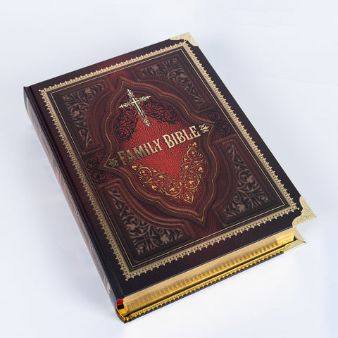 Decorative family bible with intricate design on a white background