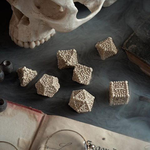 DICE MACABRE SET BEIGE AND BROWN SKULLS 7 DICE RPG PLAYING GAMES Q-WORKSHOP NEW